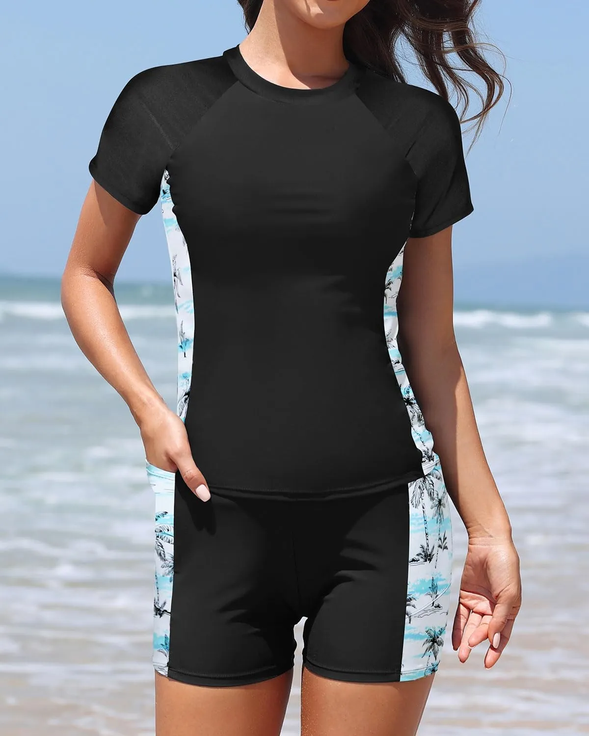Daci Women's Two Piece Rash Guard - Short Sleeve Swim Shirt with Built-in Bra and Shorts with Pockets