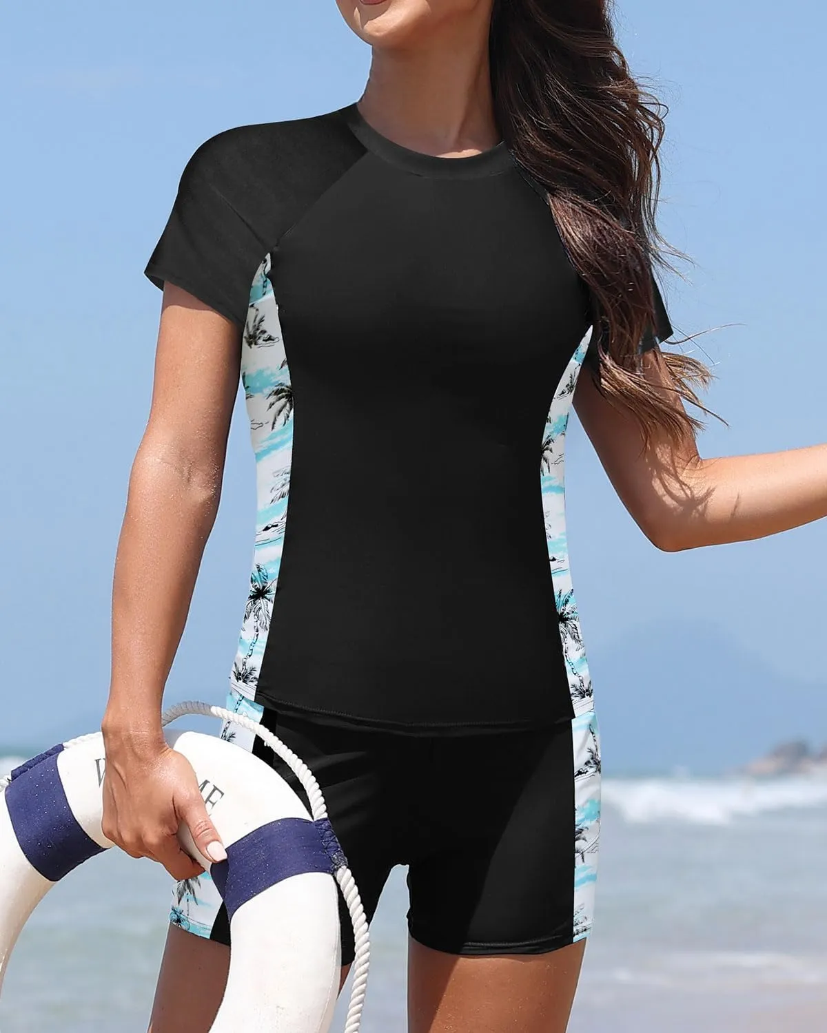 Daci Women's Two Piece Rash Guard - Short Sleeve Swim Shirt with Built-in Bra and Shorts with Pockets